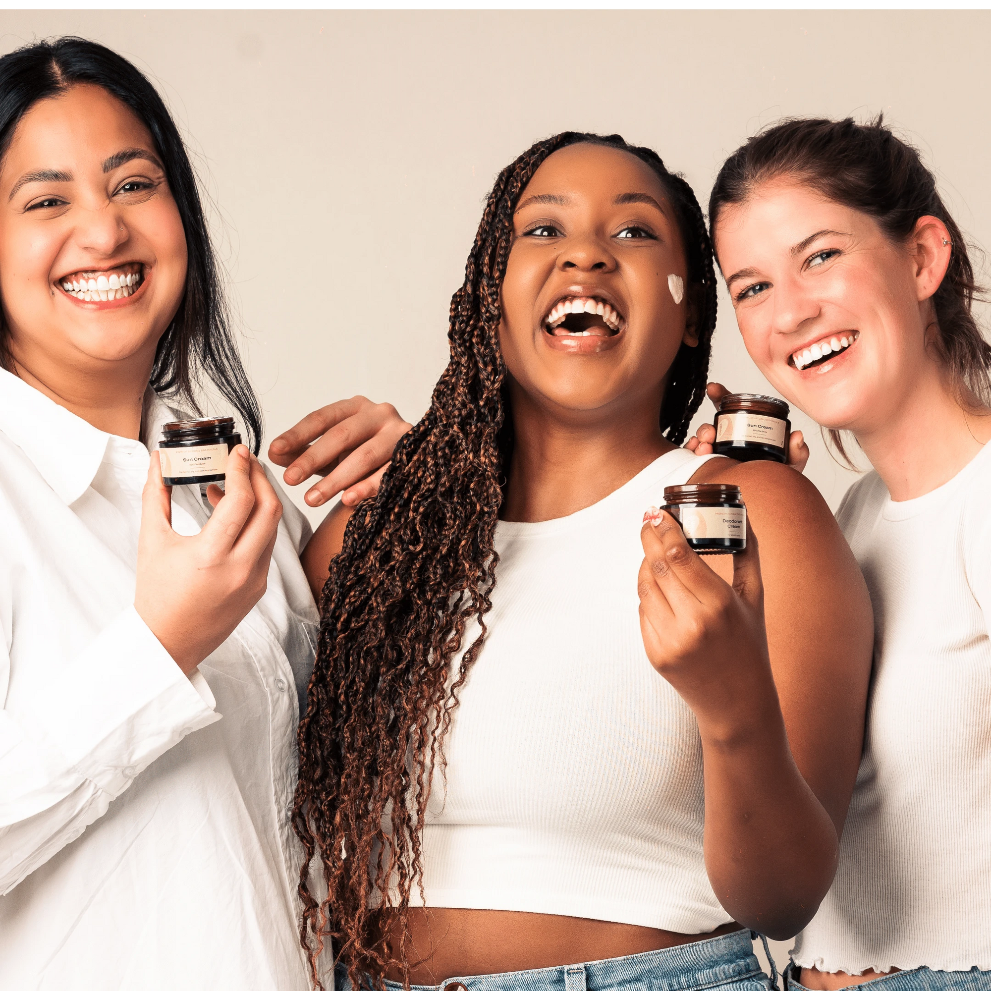 Women using sunscreen cream