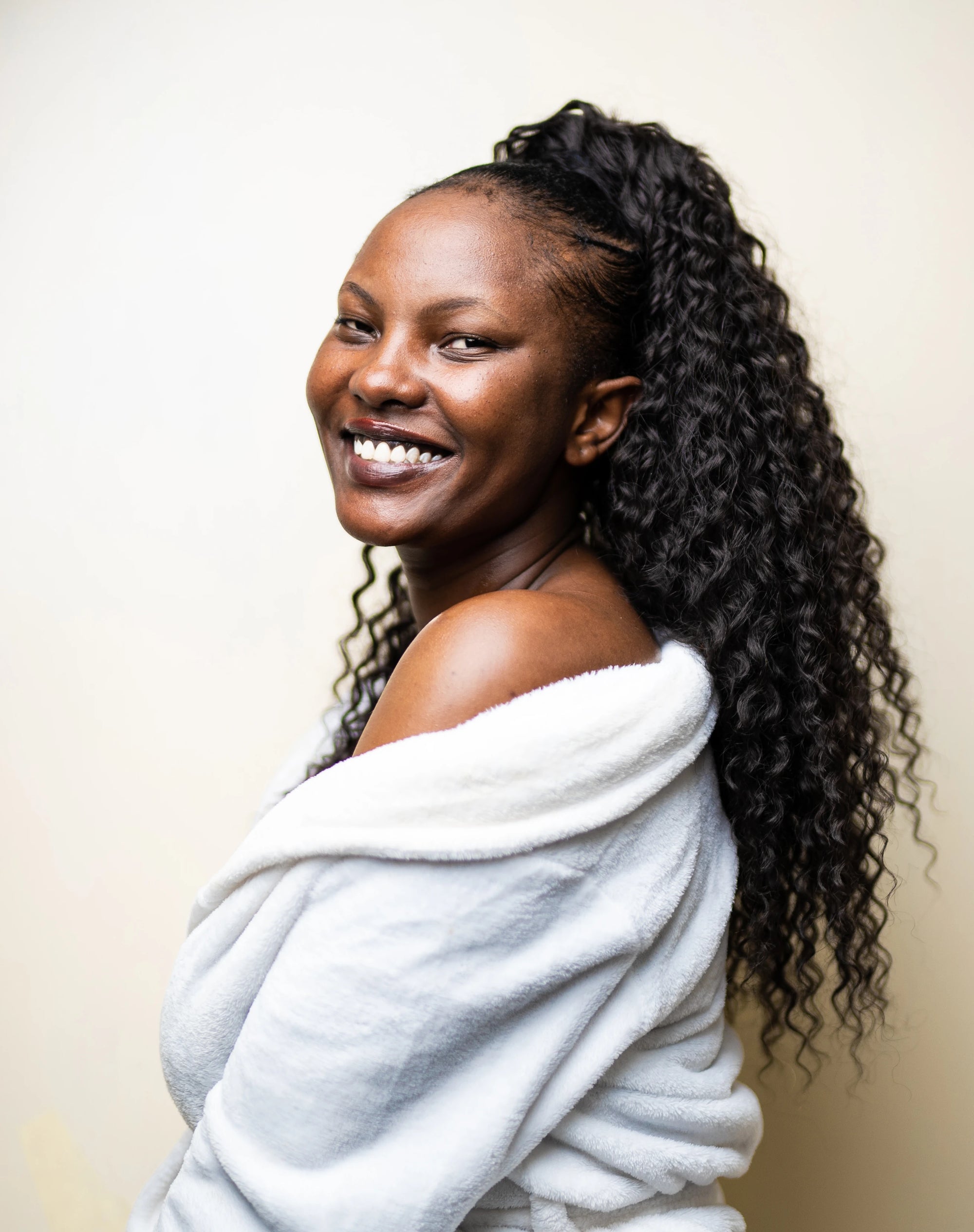 African beauty smiling into the camera.