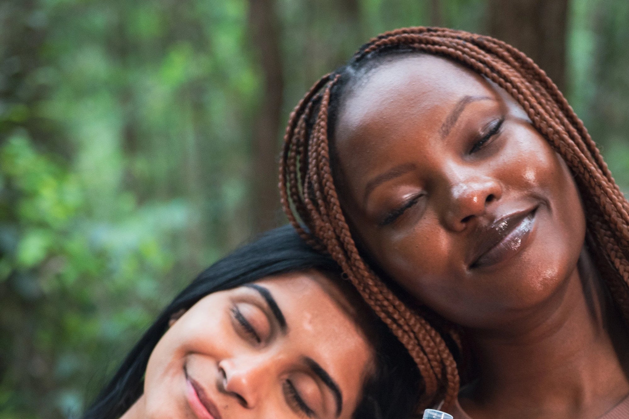 Women with glowing skin smiling